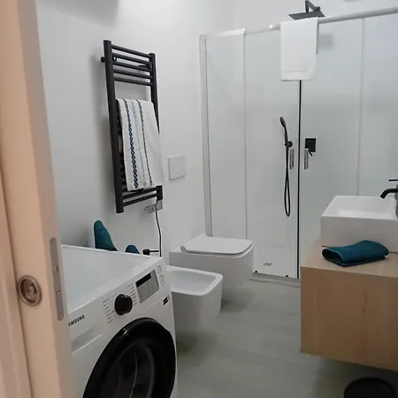 Piazza Roma Next And Station By Revenue House